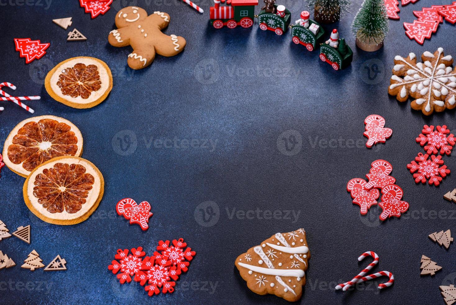 Christmas homemade gingerbread cookies on a dark concrete table photo