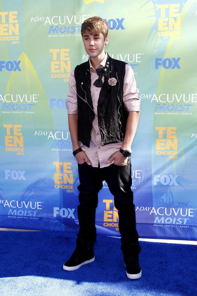 LOS ANGELES, AUG 7 - Justin Bieber arriving at the 2011 Teen Choice Awards at Gibson Amphitheatre on August 7, 2011 in Los Angeles, CA photo