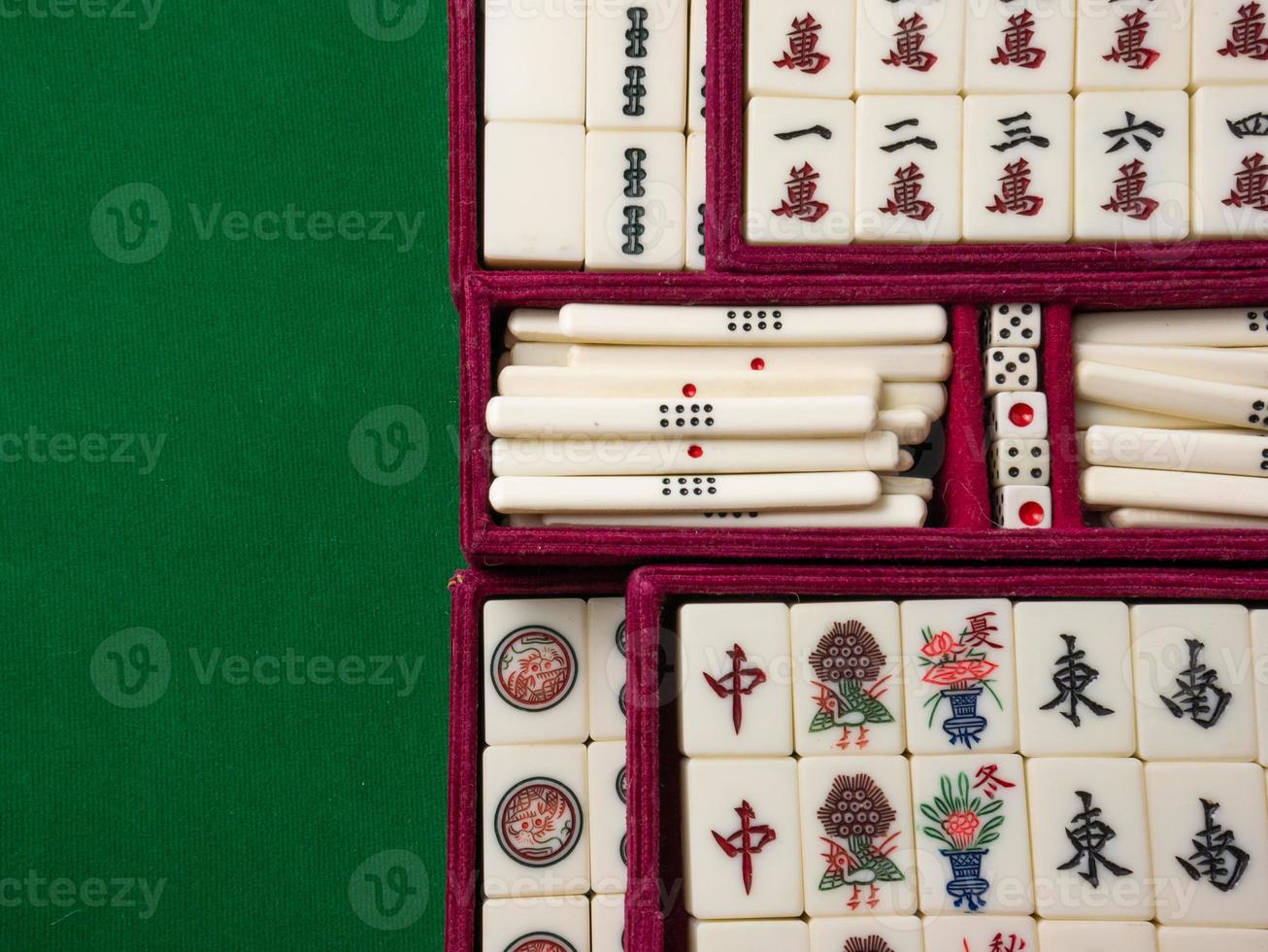 The mahjong on table ancient asian board game close up image photo