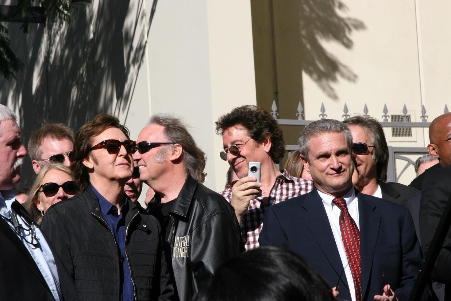 LOS ANGELES, FEB 9 - Paul McCartney, Neil Young at the Hollywood Walk of Fame Ceremony for Paul McCartney at Capital Records Building on February 9, 2012 in Los Angeles, CA photo