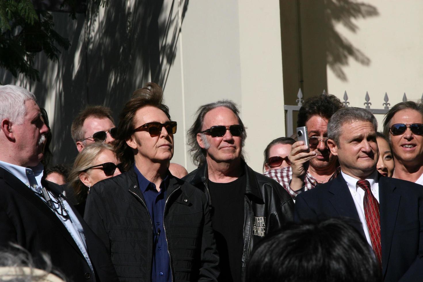 LOS ANGELES, FEB 9 - Paul McCartney, Neil Young at the Hollywood Walk of Fame Ceremony for Paul McCartney at Capital Records Building on February 9, 2012 in Los Angeles, CA photo