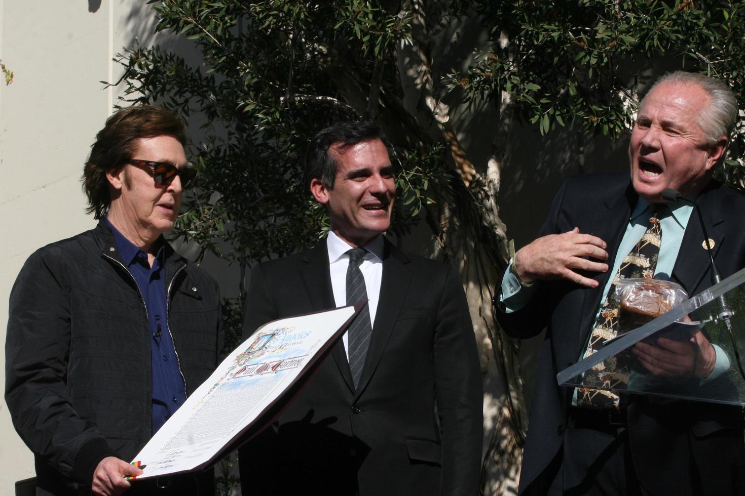 LOS ANGELES, FEB 9 - Paul McCartney, Eric Garcetti, Tom LeBonge at the Hollywood Walk of Fame Ceremony for Paul McCartney at Capital Records Building on February 9, 2012 in Los Angeles, CA photo