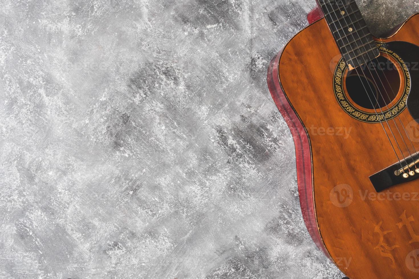 Top view of Guitar on grunge background, Free space for text photo