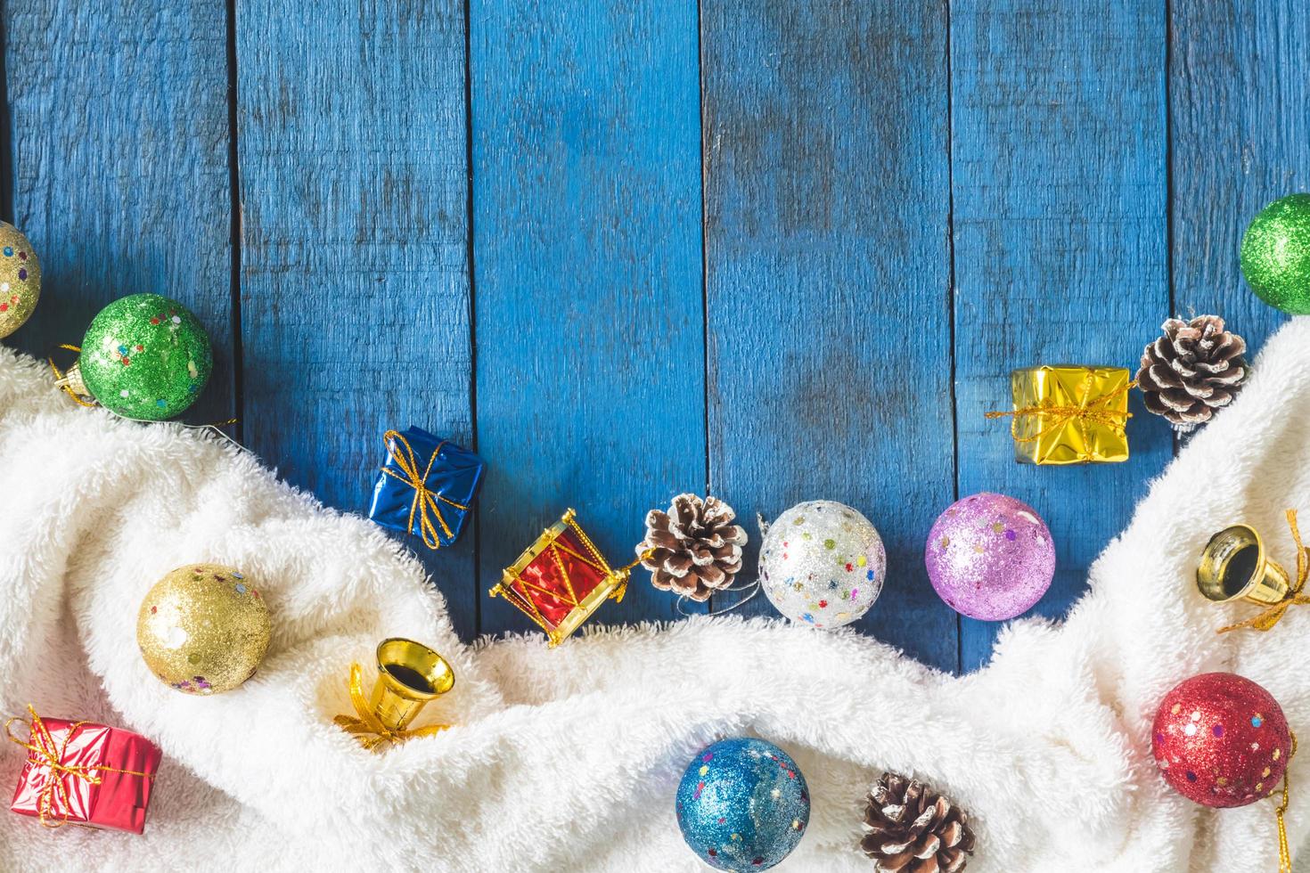 Top view of Christmas decoration on wooden table background. photo