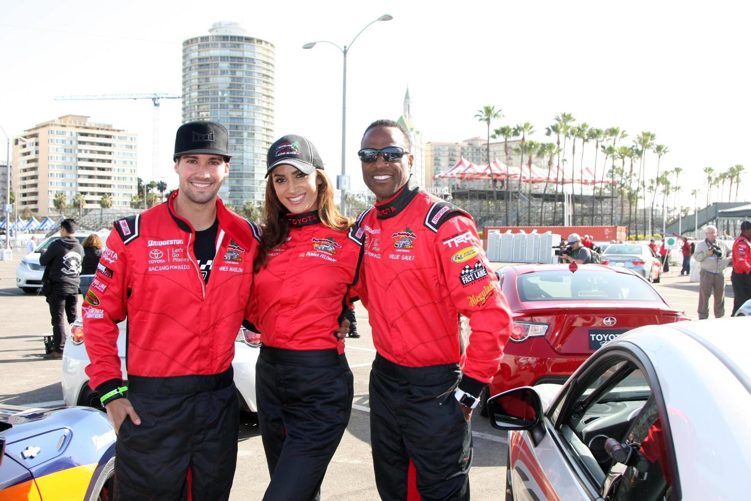 LOS ANGELES, FEB 7 -  James Maslow, Donna Feldman, Willie Gault at the Toyota Grand Prix of Long Beach Pro Celebrity Race Press Day at the Grand Prix Compound on April 7, 2015 in Long Beach, CA photo