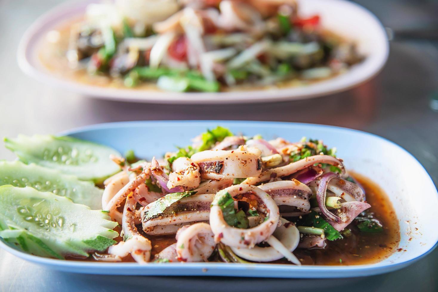 Thai spicy squid salad - Thai famous food recipe photo