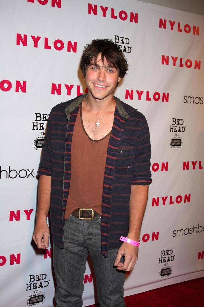 LOS ANGELES, APR 10 - Logan Huffman arrives at the NYLON Magazine 13th Anniversary Celebration at Smashbox on April 10, 2012 in Los Angeles, CA photo