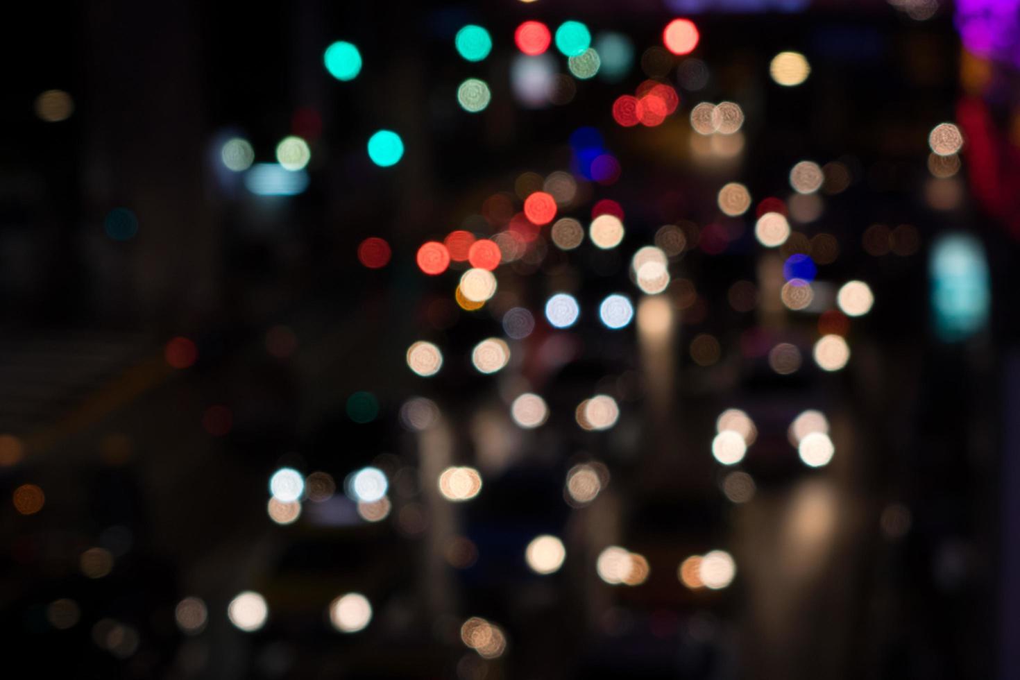 Blurred Defocused Lights of Traffic jam in city photo