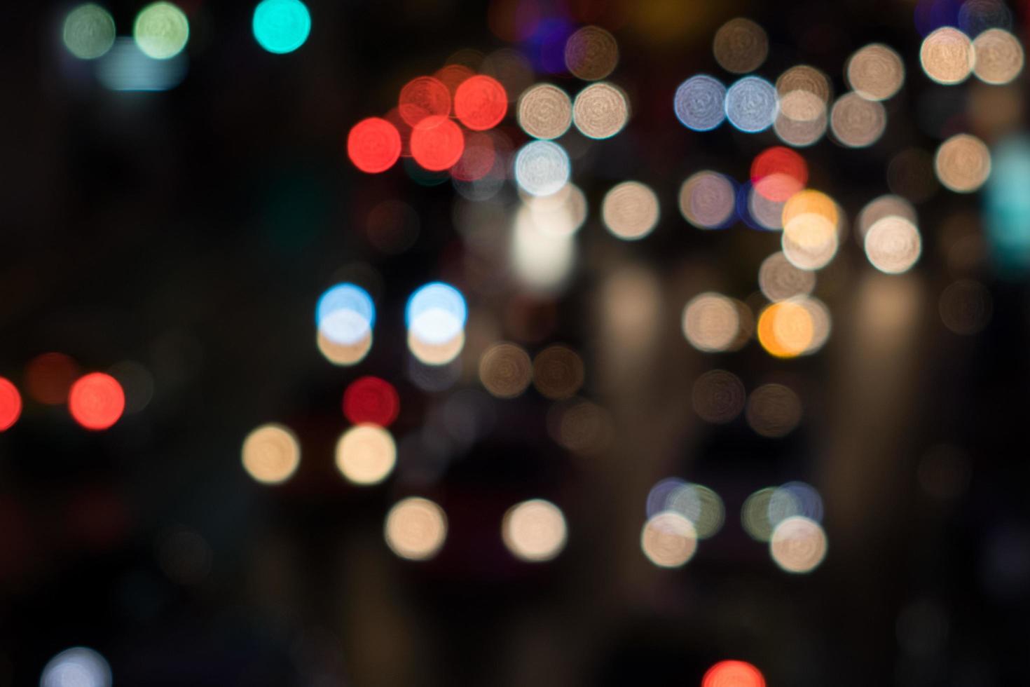 Blurred Defocused Lights of Traffic jam in city photo