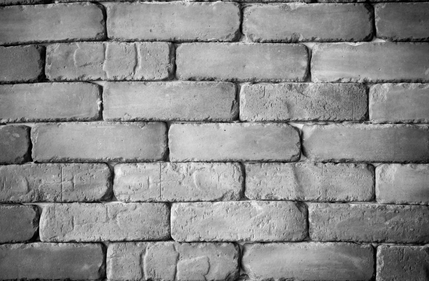 fondo de pared de ladrillo en color blanco y negro foto