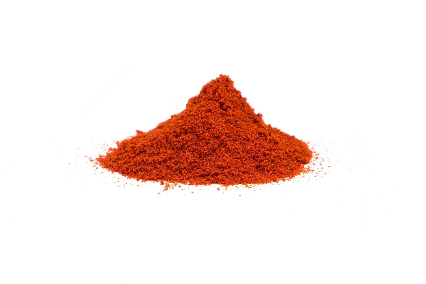 Paprika powder isolated on white background photo