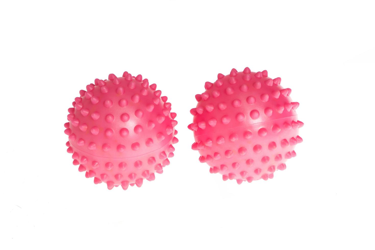Spiky massage ball isolated on the white background photo