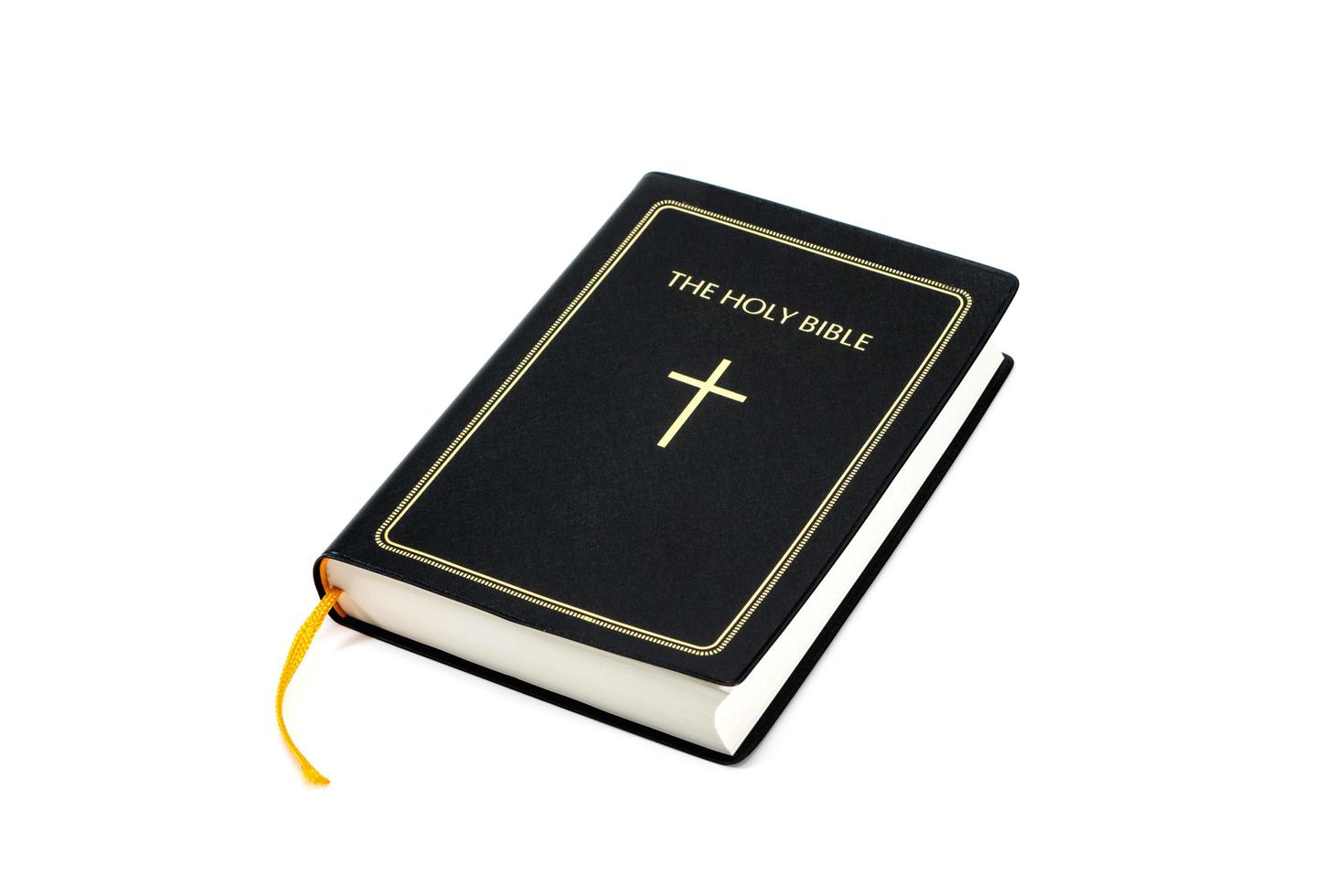 Holy Bible on white background photo