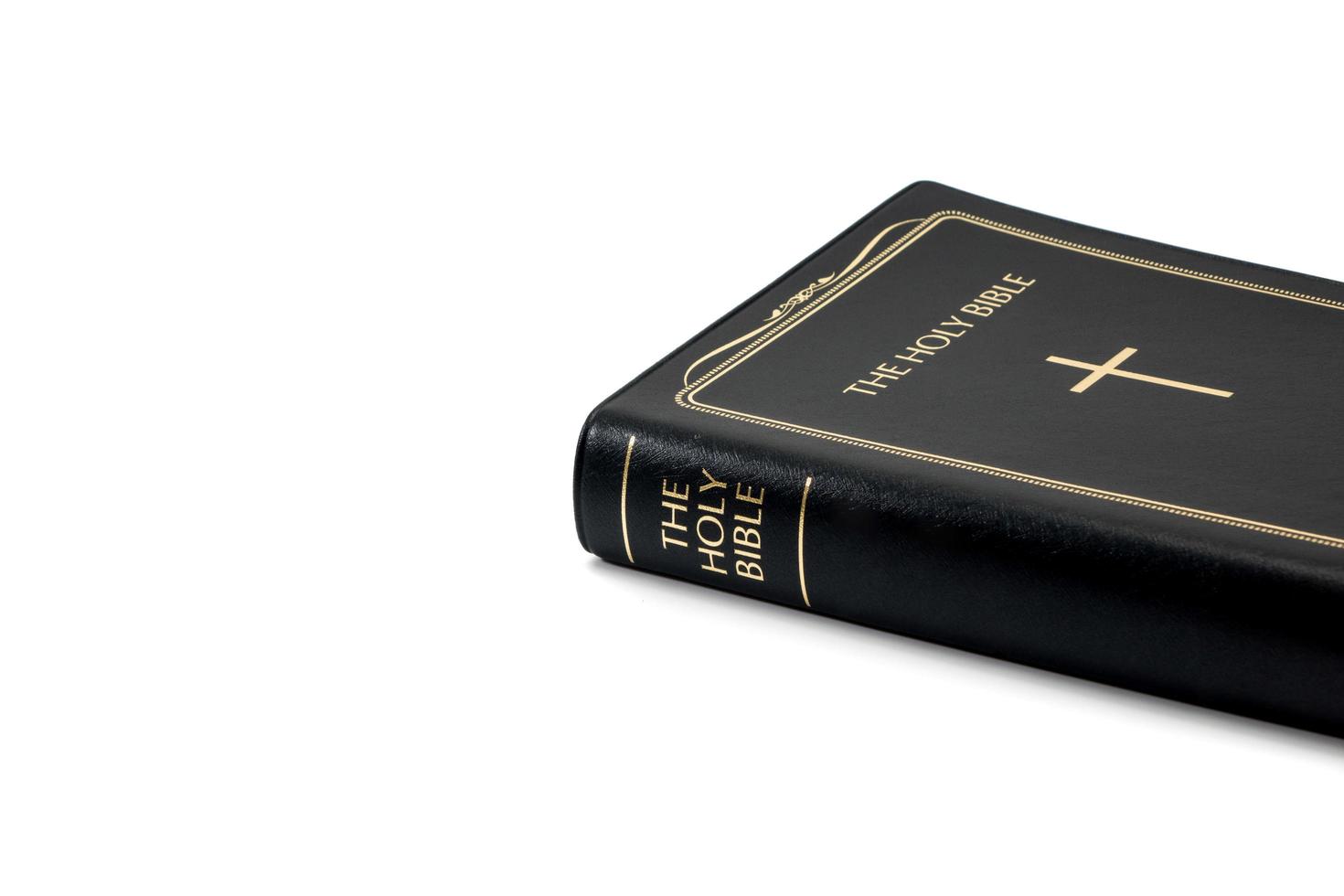 Holy Bible on white background photo