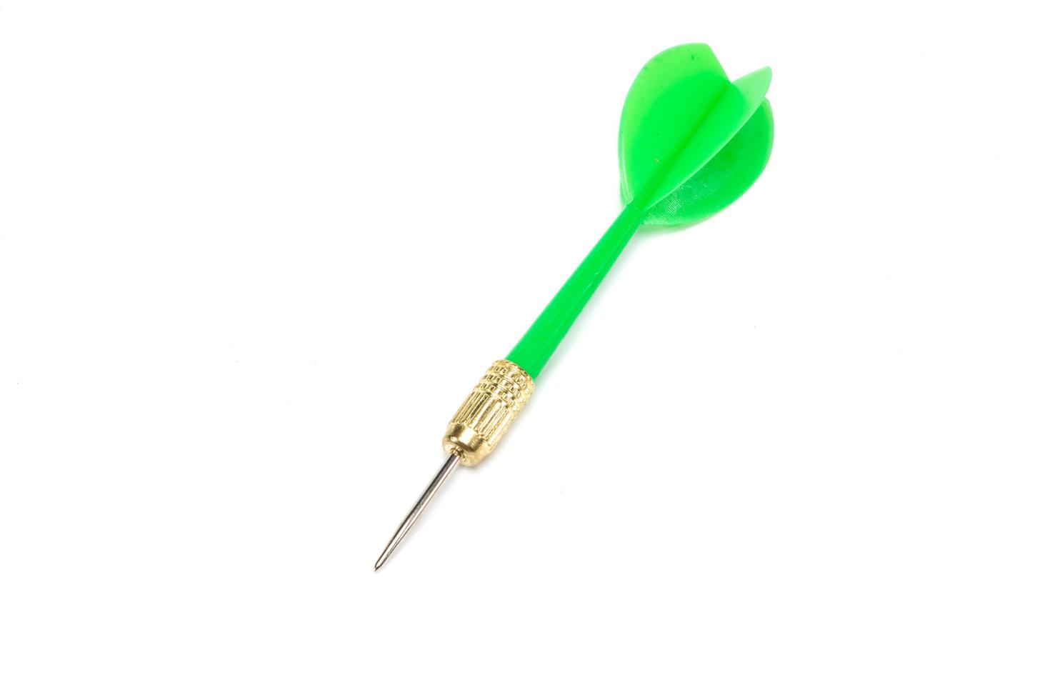 Green dart isolated on white background photo