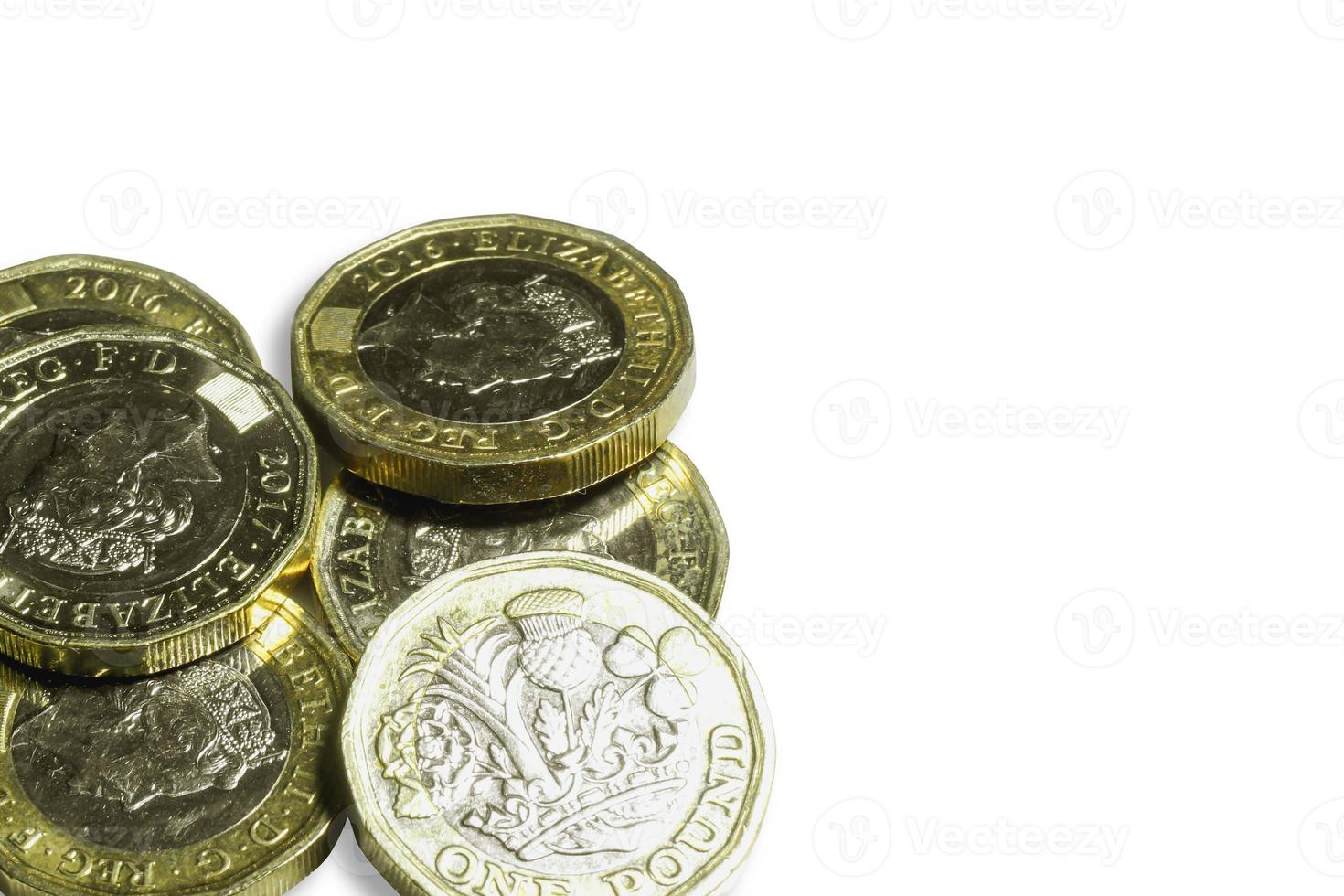 British currency the new one pounds coins isolate on white background. photo