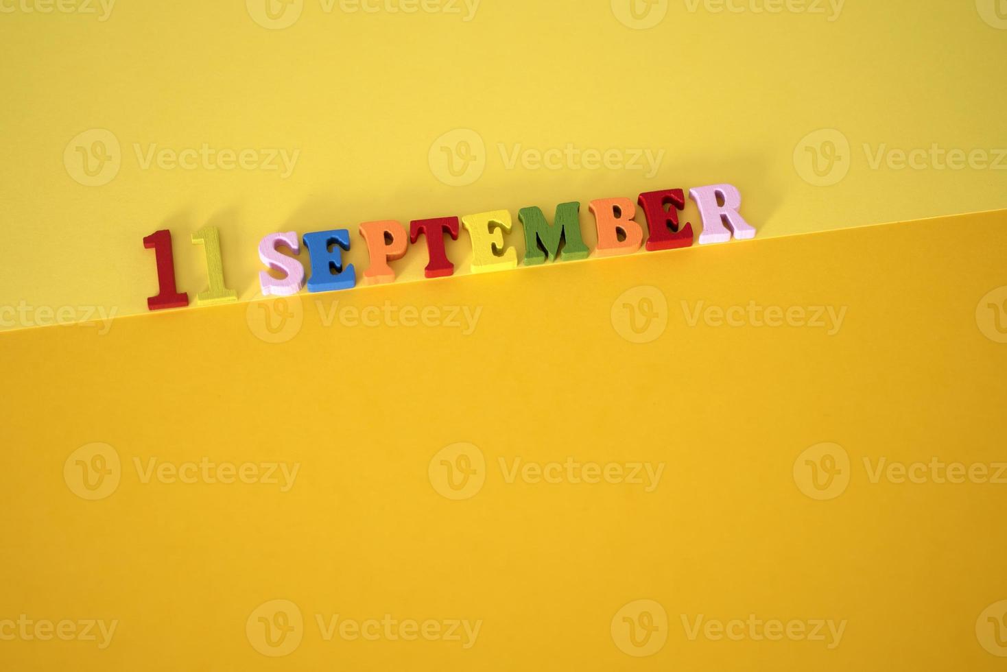 September 11 on a yellow background. Patriot's Day in the United States. photo