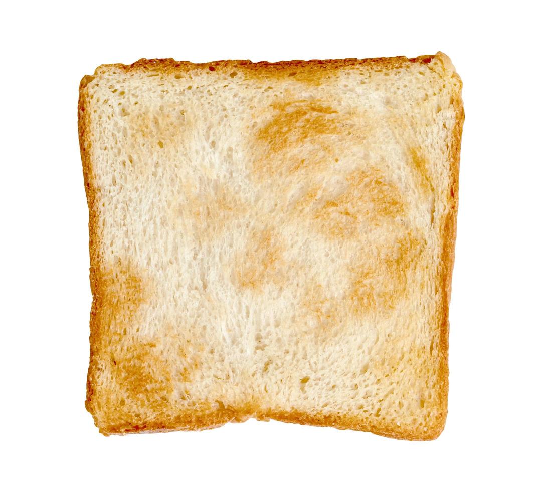 Rebanada de pan tostado aislado sobre fondo blanco. foto