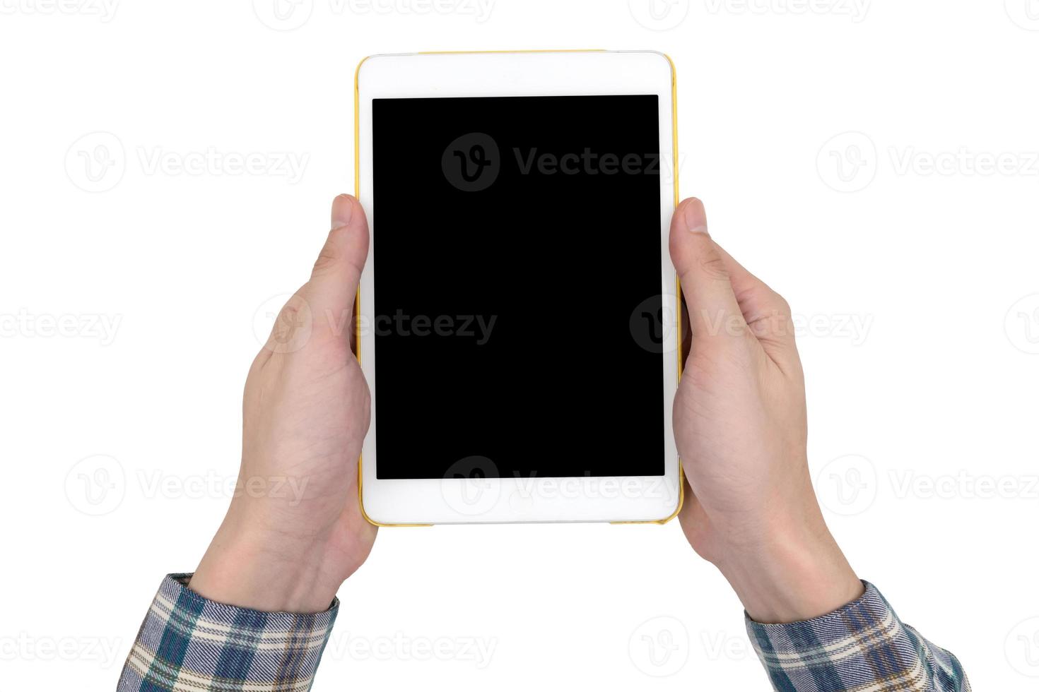 Male hands holding a white tablet touch computer gadget with touch blank black screen isolated on  white background. photo