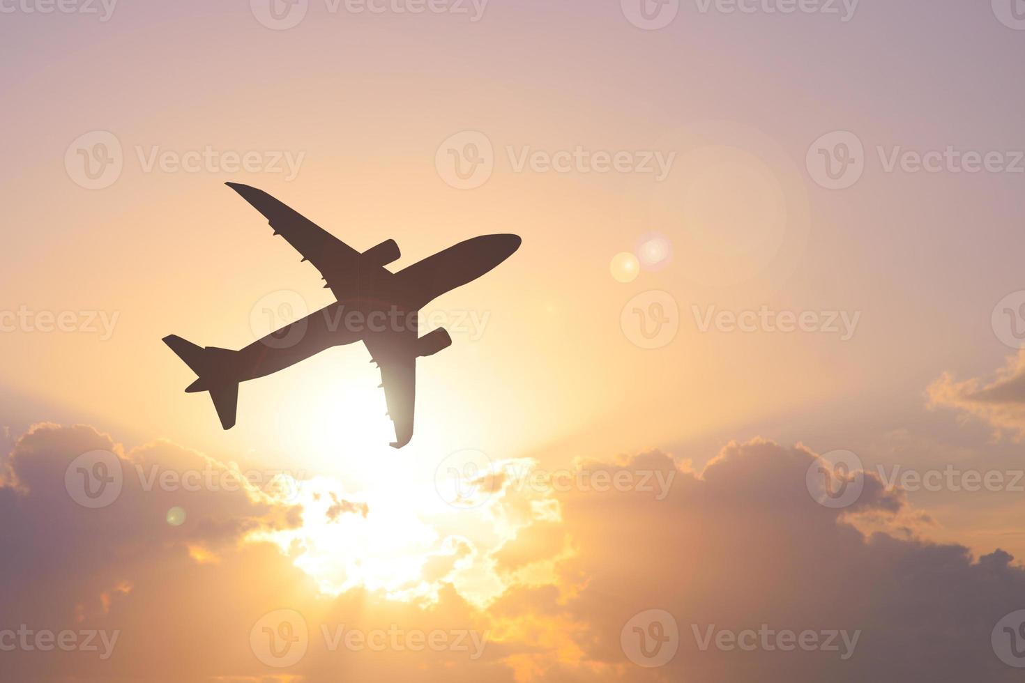 Silhouette of a passenger plane in the sky. Travel and travel ideas around the world. photo