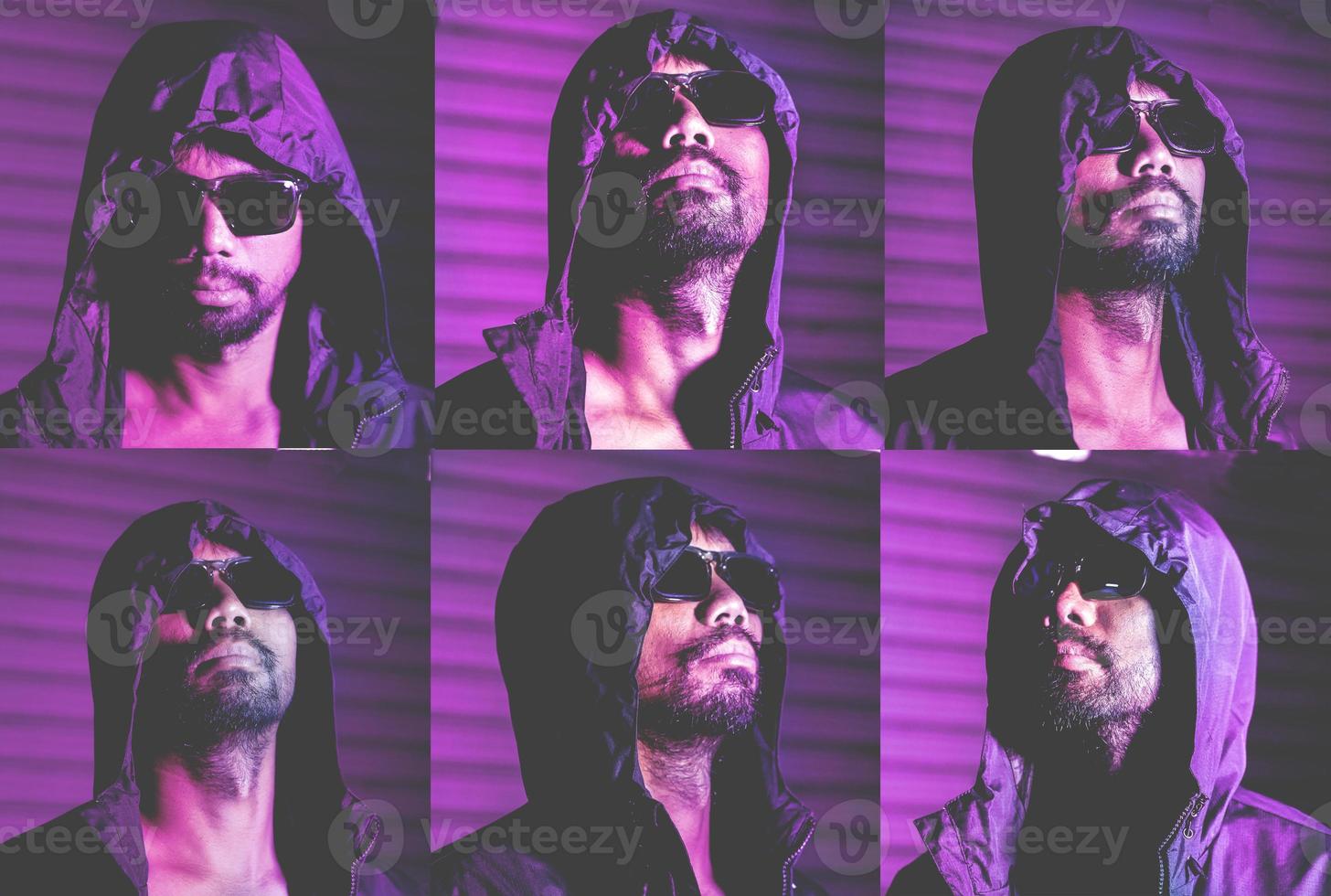 Beautiful serious mysterious men in darkness looking dramatic. Closeup portrait in dark shadow low key. Art. closeup front face photo