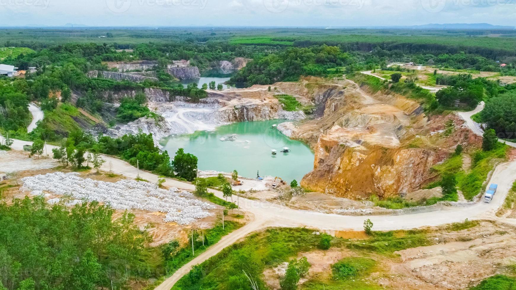aerial photograph of a large pit of a gypsum mine. A large gypsum mine