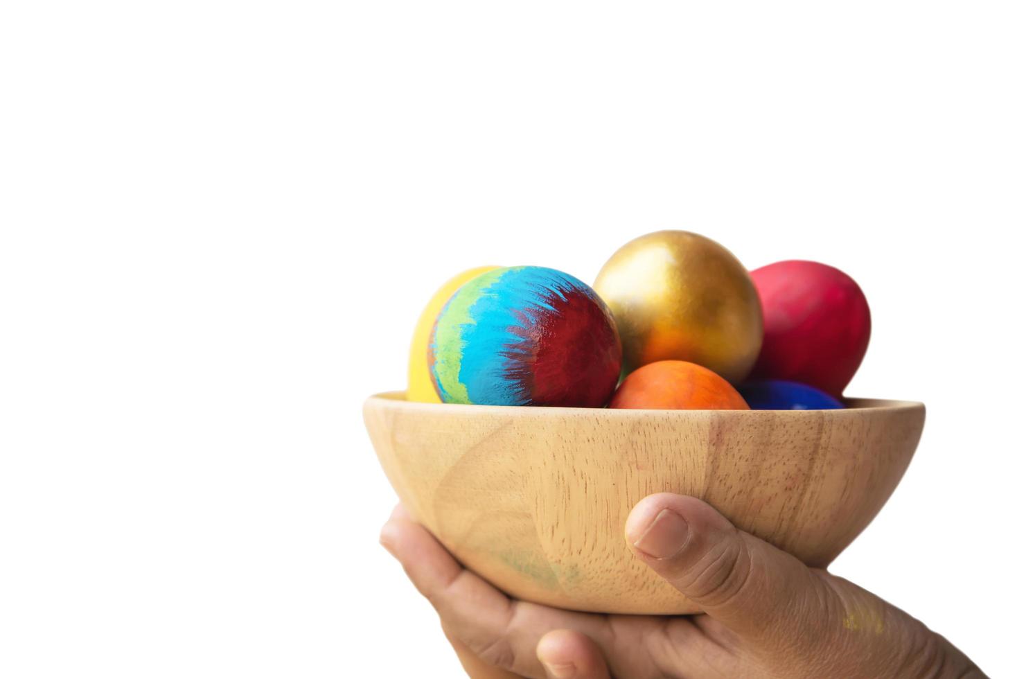 Child showing colorful Easter eggs happily - Easter holiday celebration concept photo