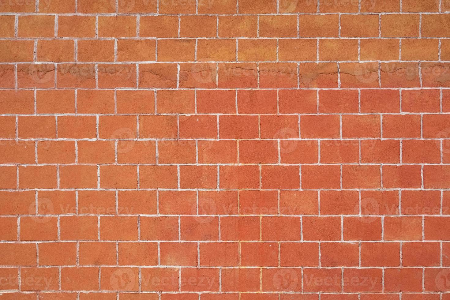 Textura de fondo de pared de ladrillo naranja foto