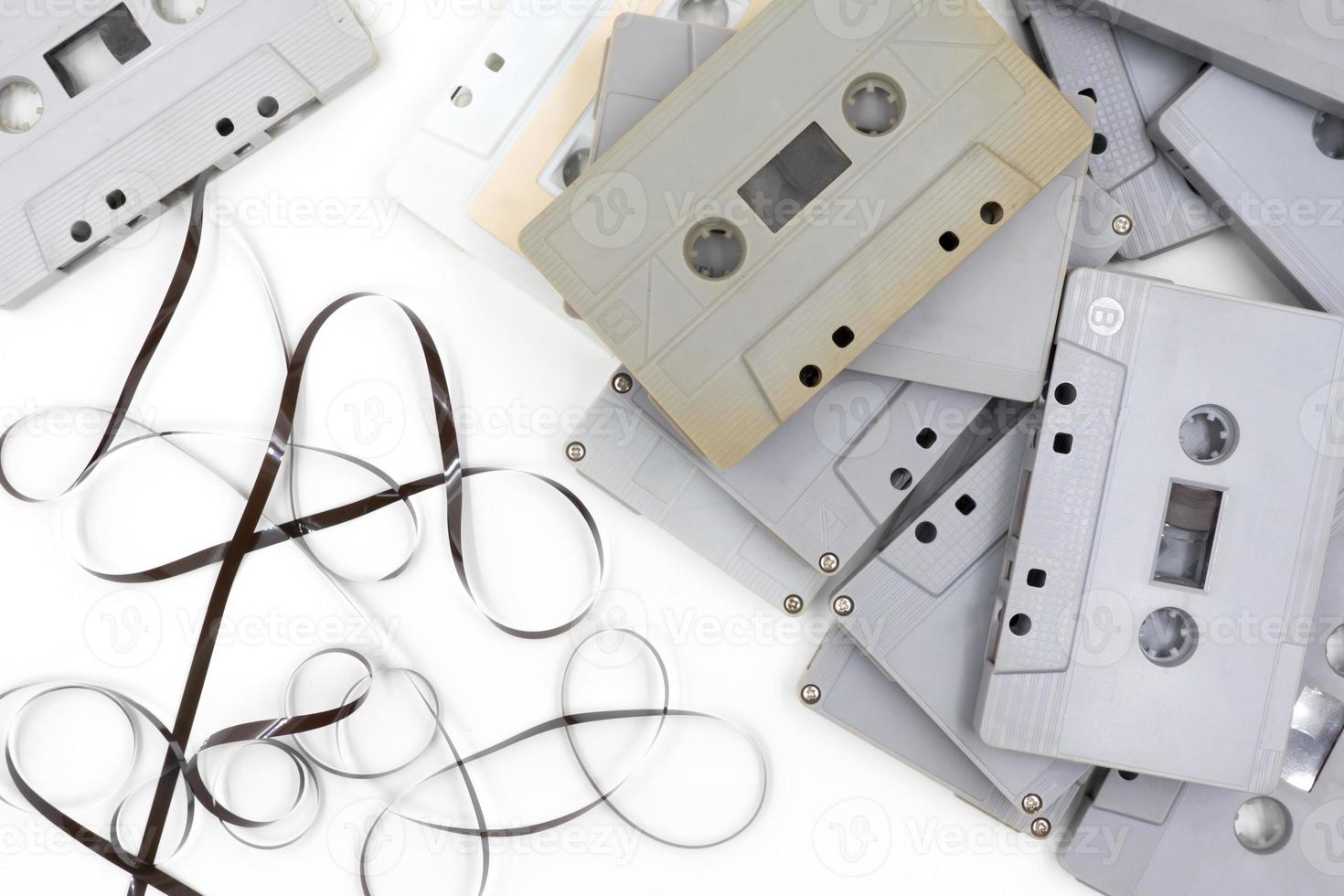 group of old cassette tapes on white background. photo