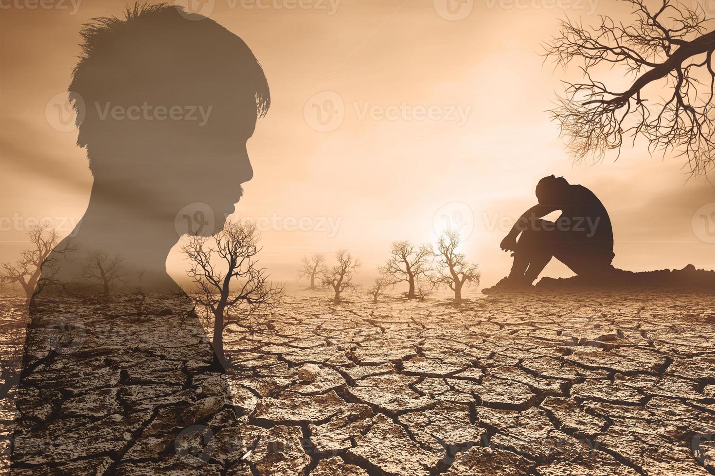 concept of global warming and drought People sat mourning over the drought. A world without water and food shortages. water and food crisis photo