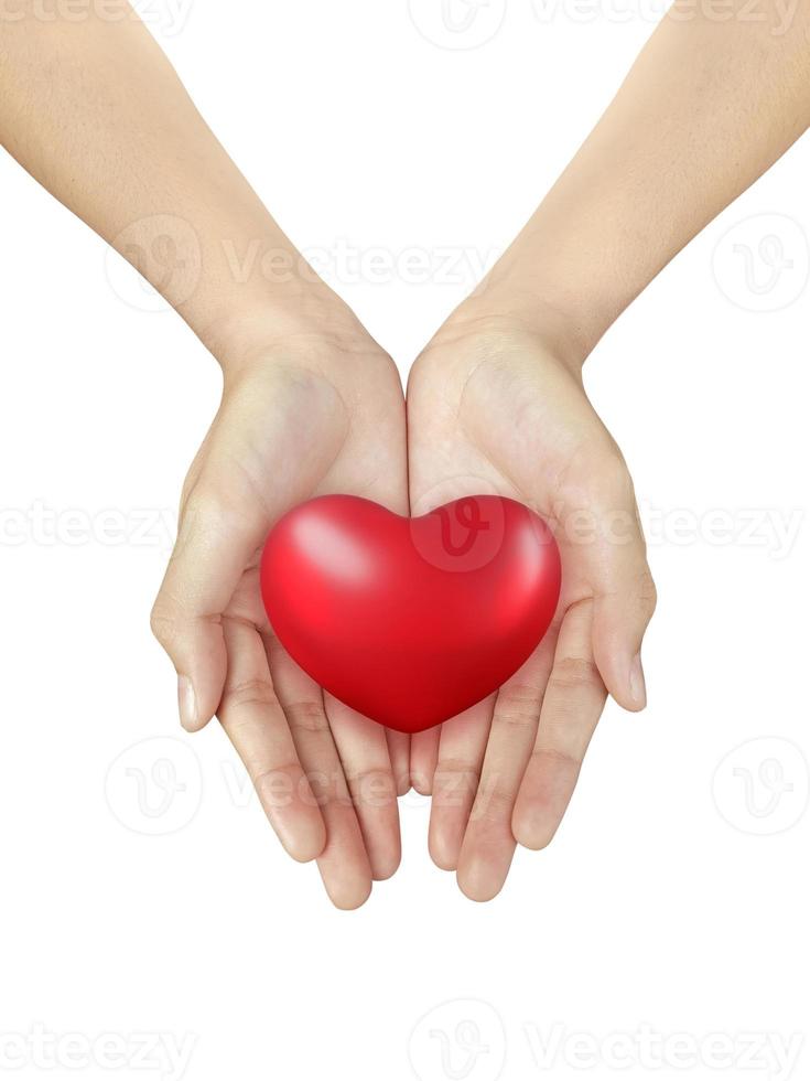 Beautiful woman hand holding a Big Red Heart on a white isolated background photo