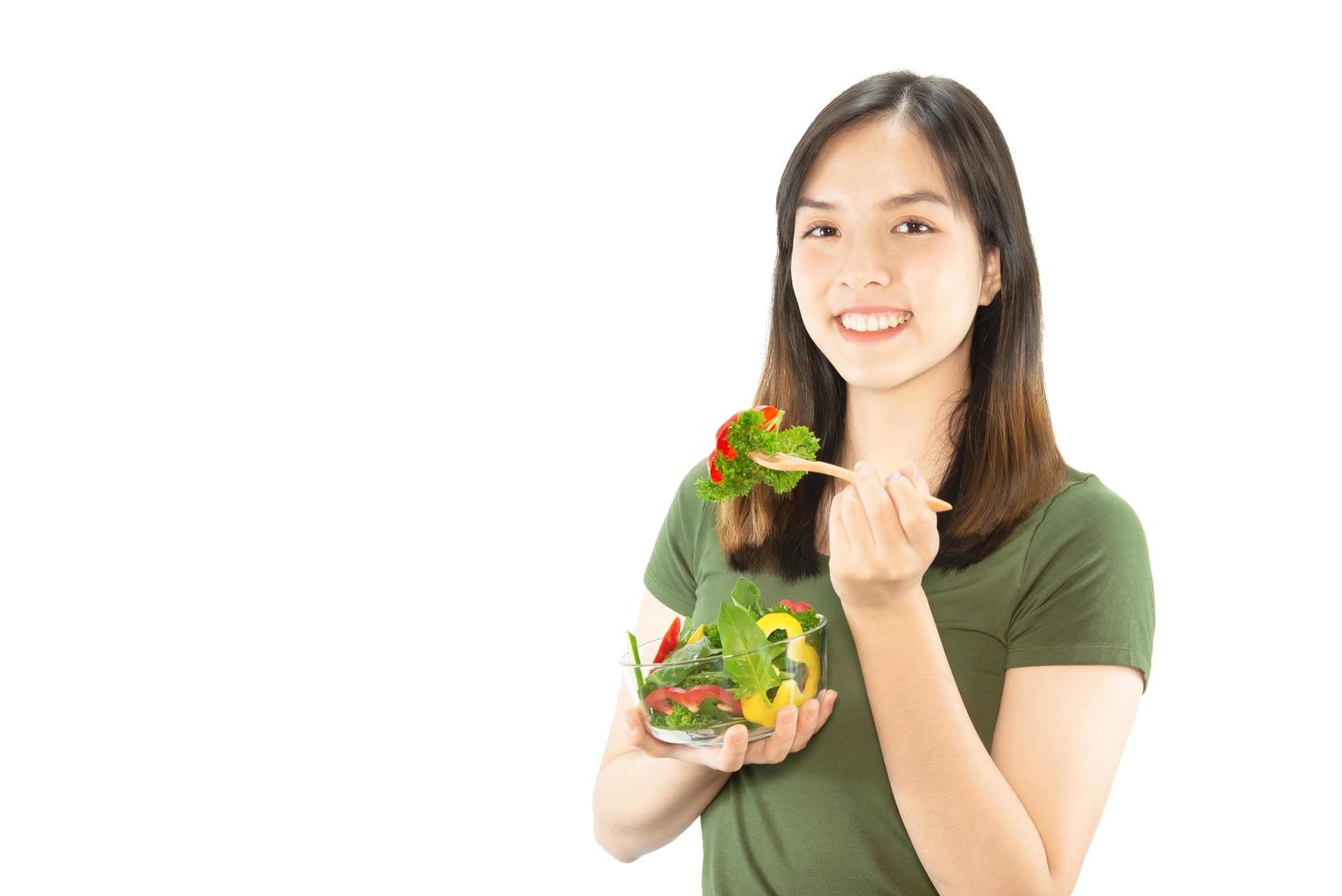 Happy lady holding kichen stuff over copy space background - people home made food preparation concept photo