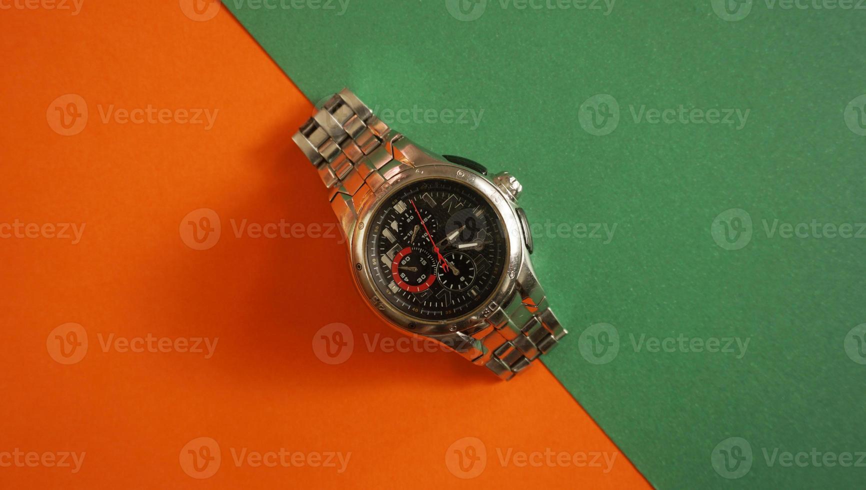 luxury watch isolated on a colored background photo