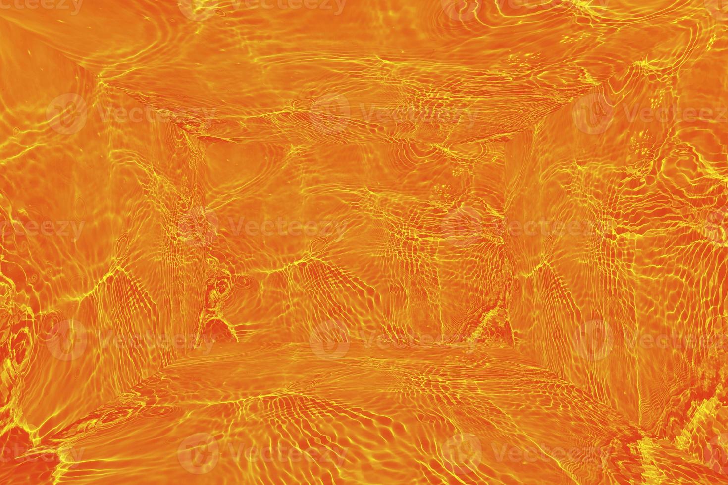 Defocus blurred transparent orange colored clear calm water surface texture with splashes and bubble. Trendy abstract nature background. Water wave in sunlight with copy space. Blue watercolor texture photo