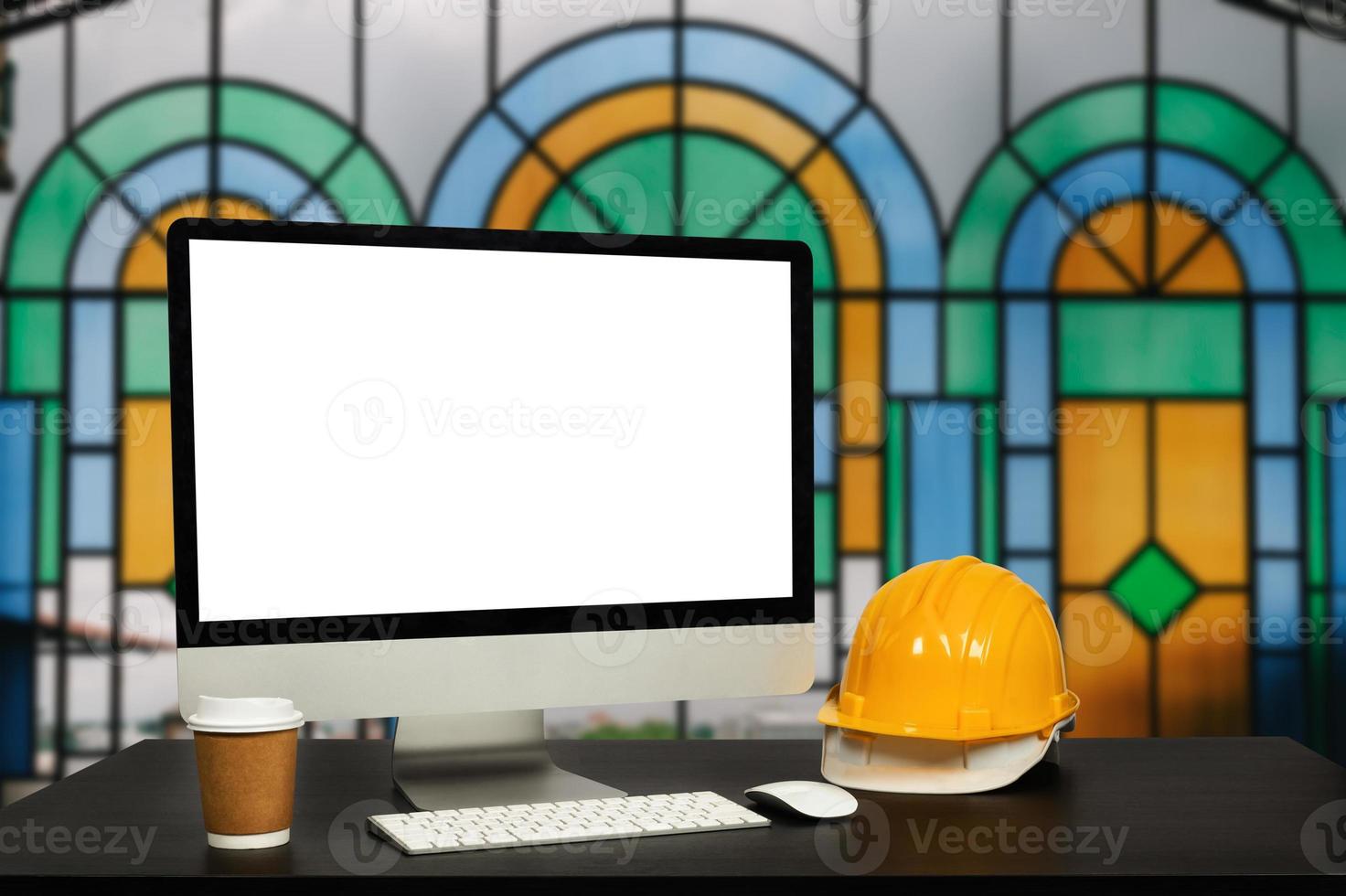 Workspace computer putting  and office construction on table in modern office blurred background.Architect concept. photo