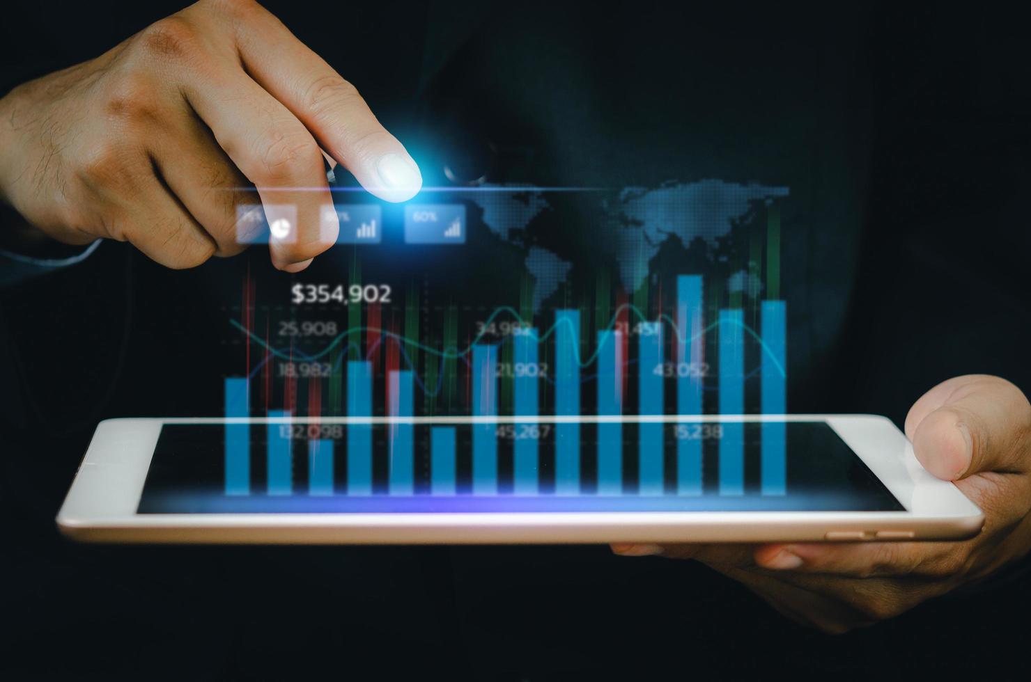 Business analysis and economic growth big data with financial graphs. Concepts of digital virtual screen marketing dashboard technology and global economic network connection. photo