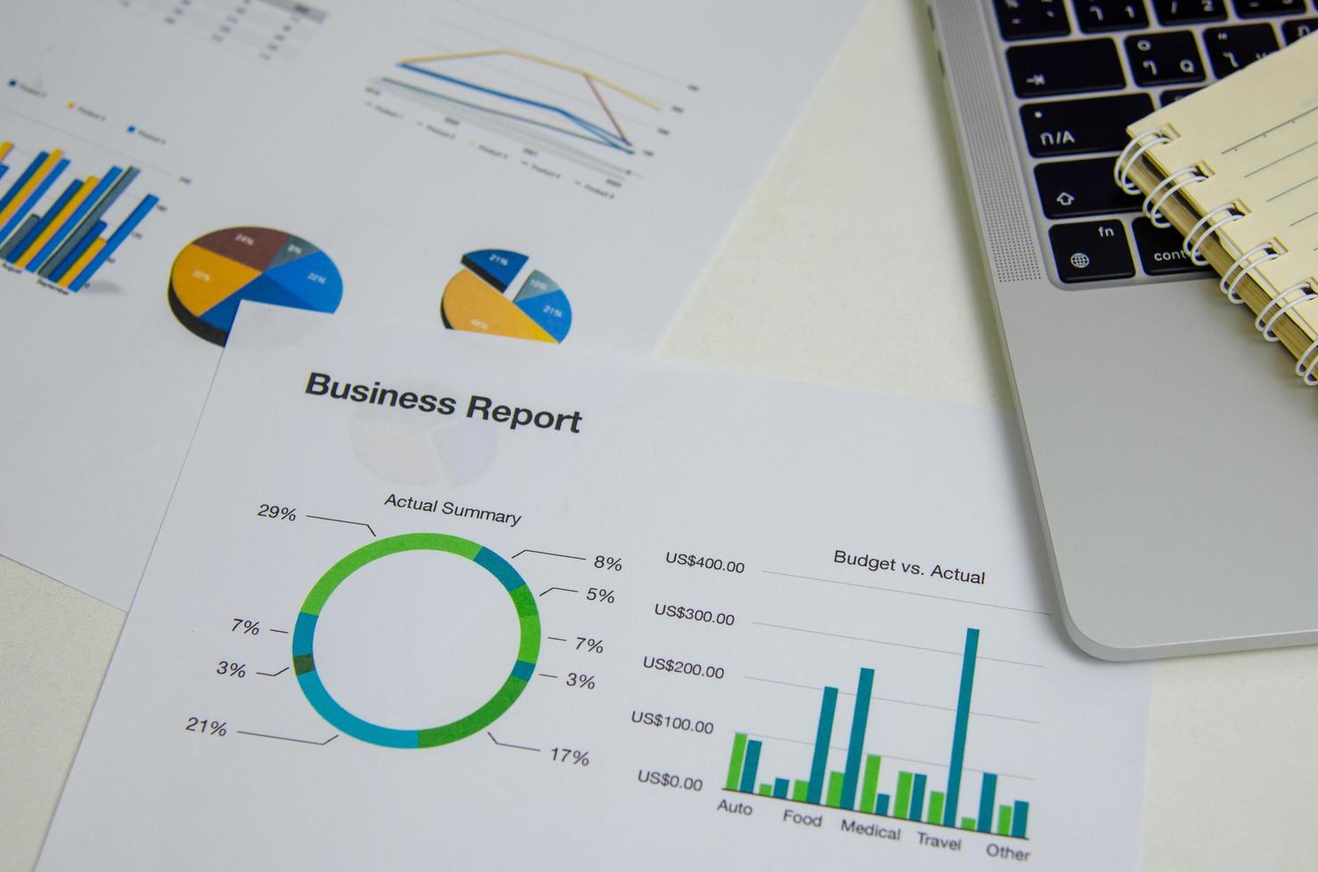 Top view document graph business finance investment marketing with computer laptop on desk. photo