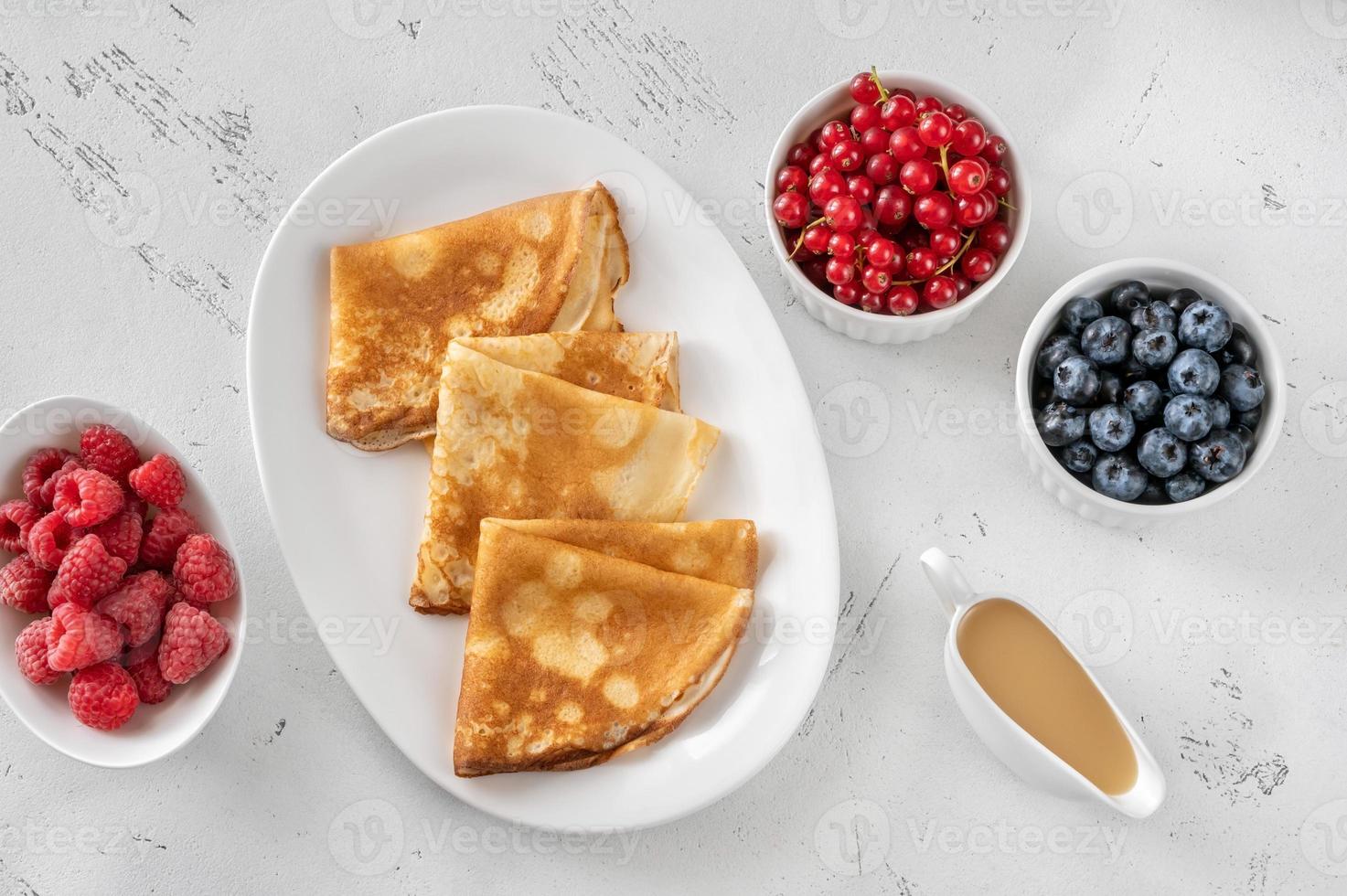 Crepes with fresh berries photo