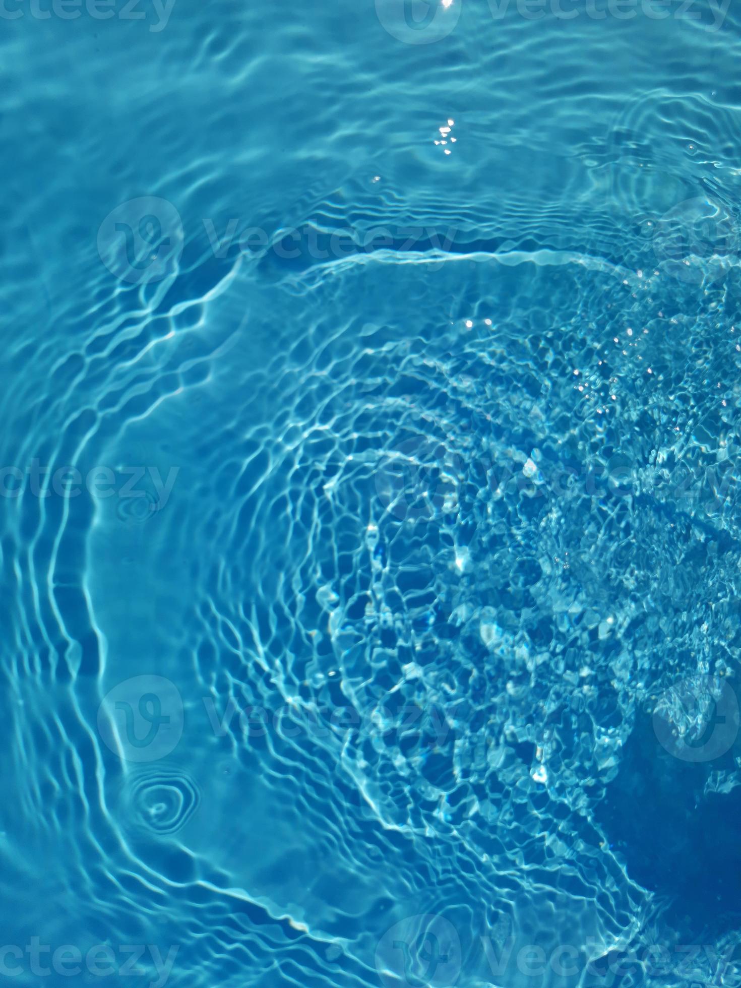 Defocus blurred blue water shining in the sea. rippled water ...