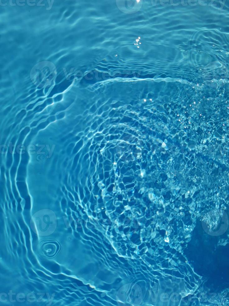 Defocus blurred blue water shining in the sea. rippled water ...