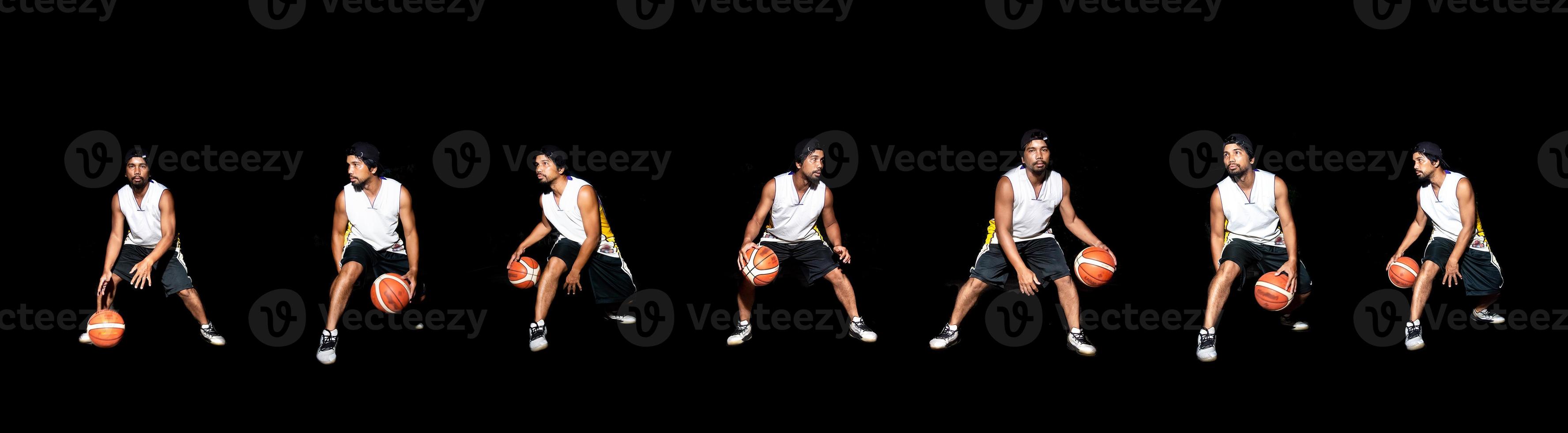 Gesture of Asian basketball player dribbling on black background. Basketball concept in Asia photo