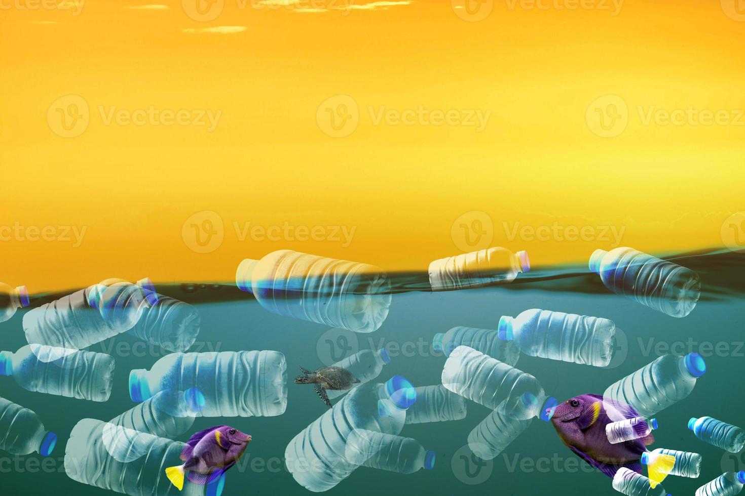 The concept of plastic waste in the sea. plastic bottles floating in the sea photo