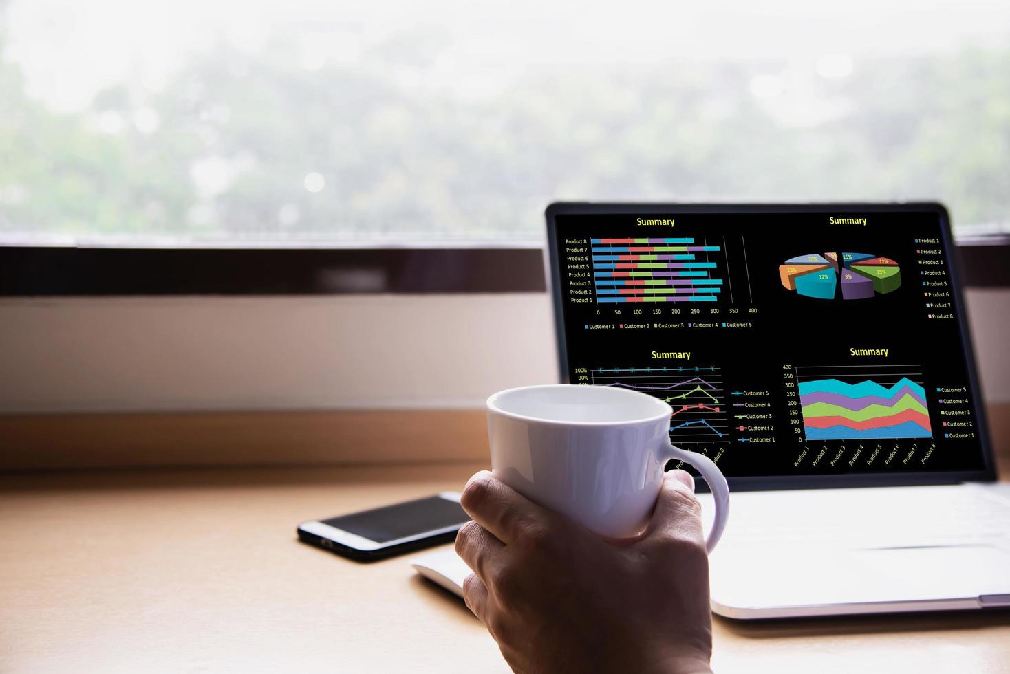 Businessman working with computer with coffee cup in the hotel room - people working lifestyle concept photo