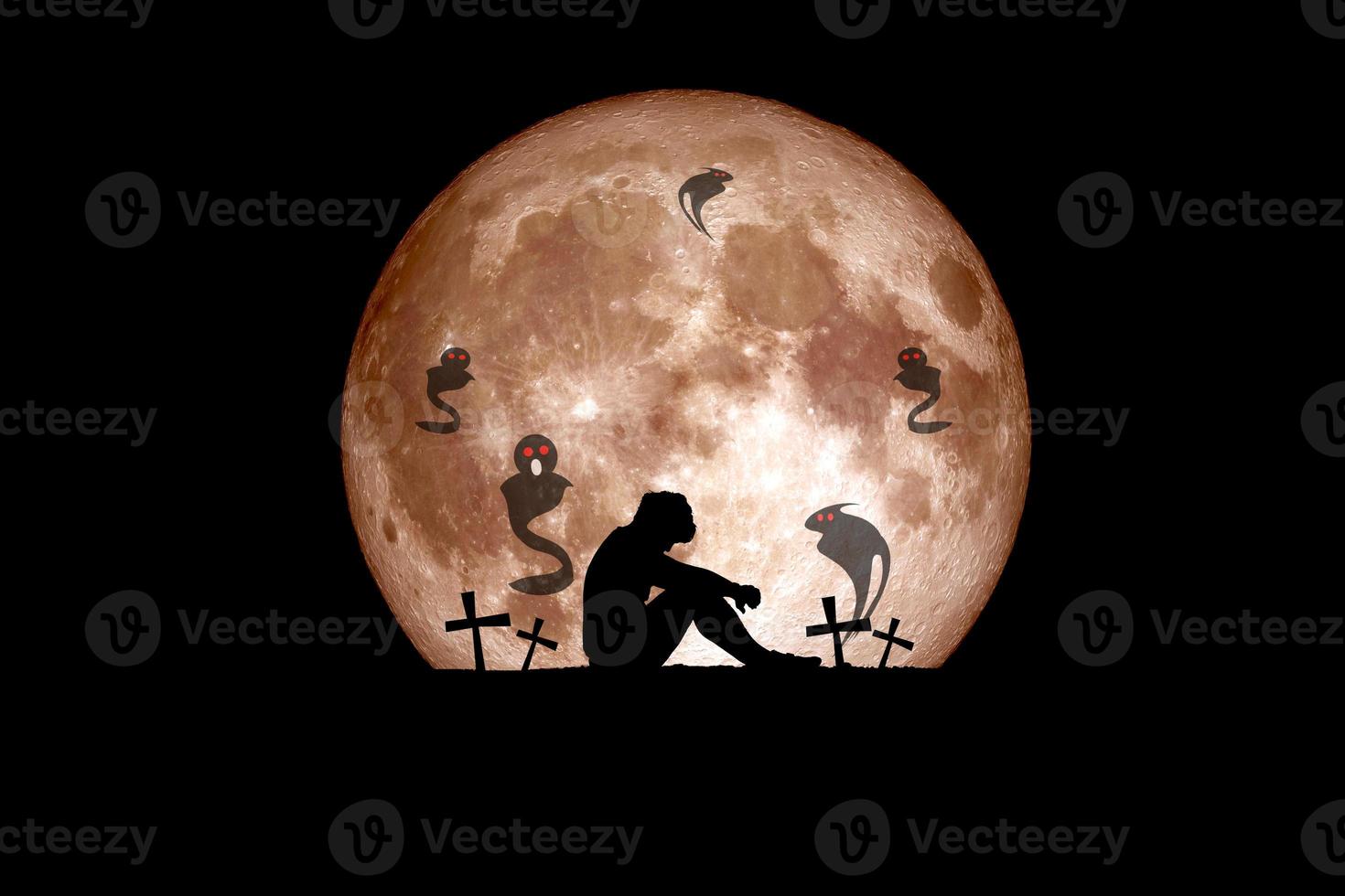 Halloween festival idea. Ghost of a dead tree with the moon in the background. photo