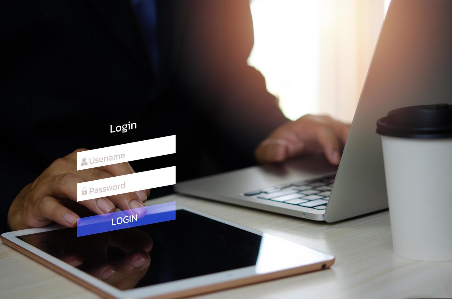 man using login interface on touch screen. user name and password inputs on virtual digital tablet account online. photo