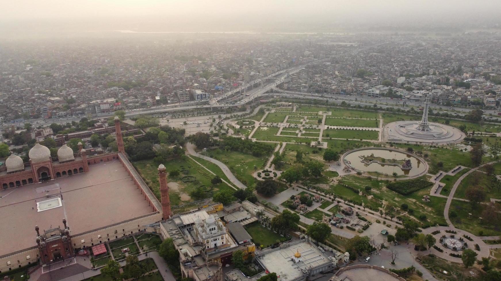 The Royal Mosque at Lahore Pakistan, Drone's High Angle View of Mughal era congregational mosque in Lahore, Punjab Pakistan photo