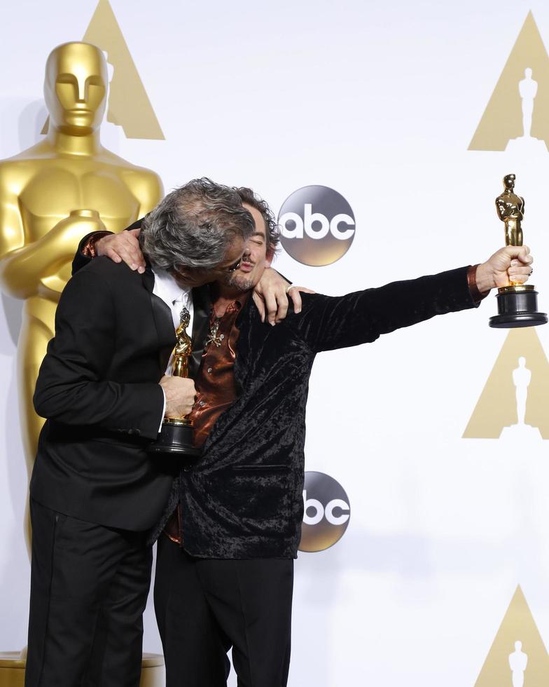 LOS ANGELES, FEB 28 - David White, Mark Mangini at the 88th Annual Academy Awards, Press Room at the Dolby Theater on February 28, 2016 in Los Angeles, CA photo