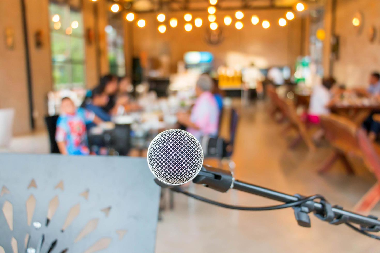 closeup microphone on stage in restaurant photo