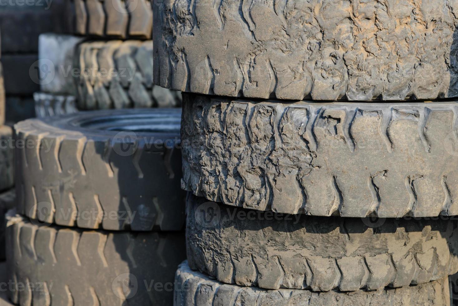 Column stack of old forklift tire photo