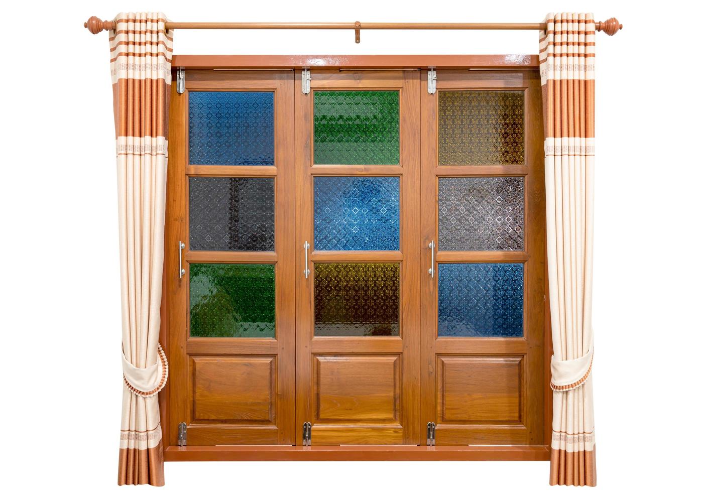 Colorful stained glass window with cream-colored curtains isolated on white background ,include clipping path photo